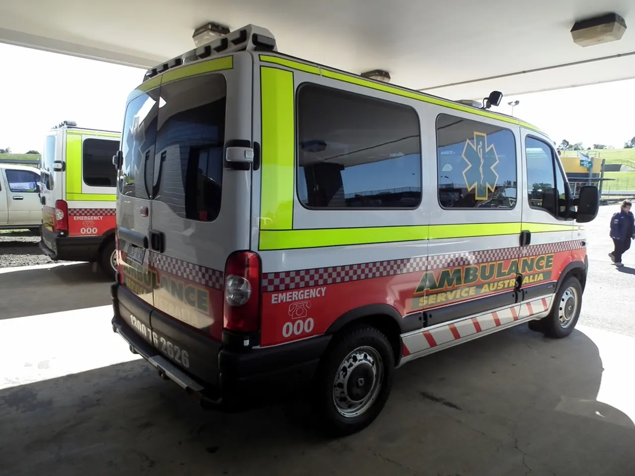 In this image there are two ambulances which are parked one beside the other. At the top there is...