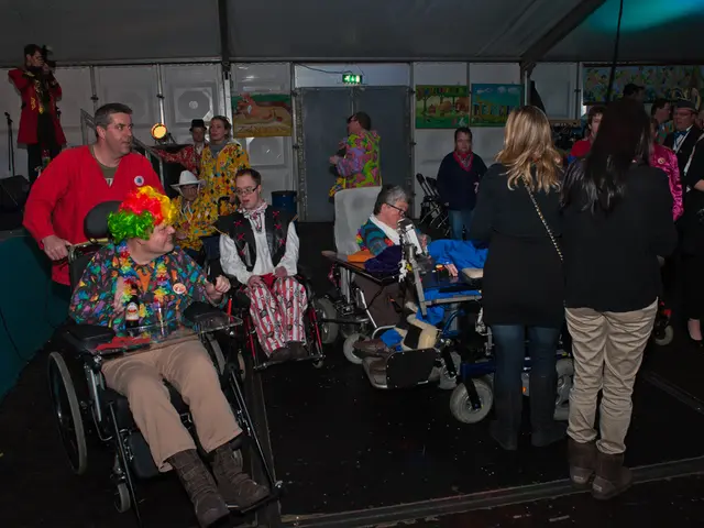 In this image, we can see people sitting in the wheelchairs and are wearing costumes. In the...