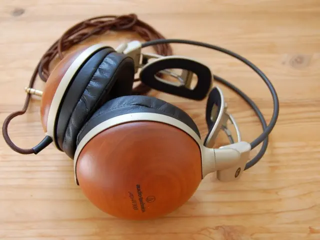 In this image we can see headset placed on the table.