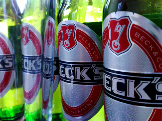 These look like beer bottles which are green in color. This is a label attached to the bottle.